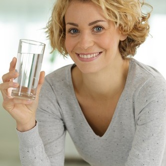 Woman drinking fresh water
